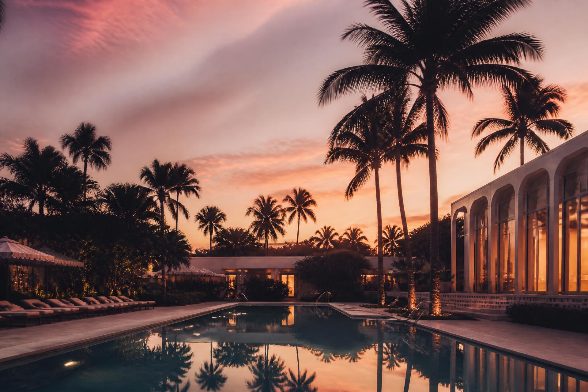 Palm-lined pool at Evermore Resort at golden hour